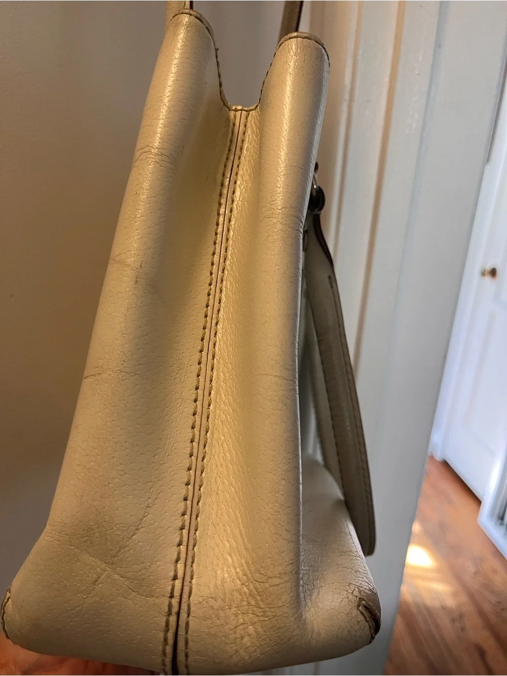 kate spade cream leather tote with gold-tone logo